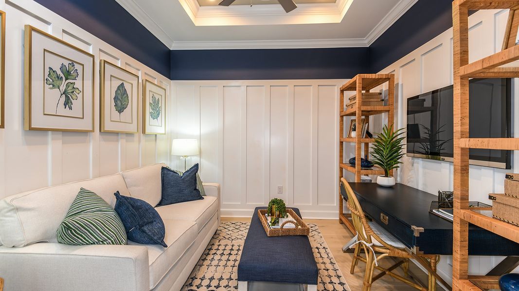 Furnished interior view inside a new home in Esplanade by the Islands, Naples (Image 7).