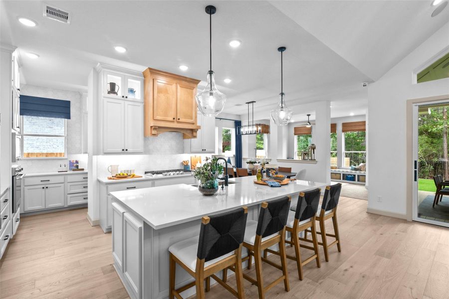 EXAMPLE PHOTO: This chefs dream Kitchen offers it all. LOTS of cabinets, quartz counters, gas cooktop & so much more!
