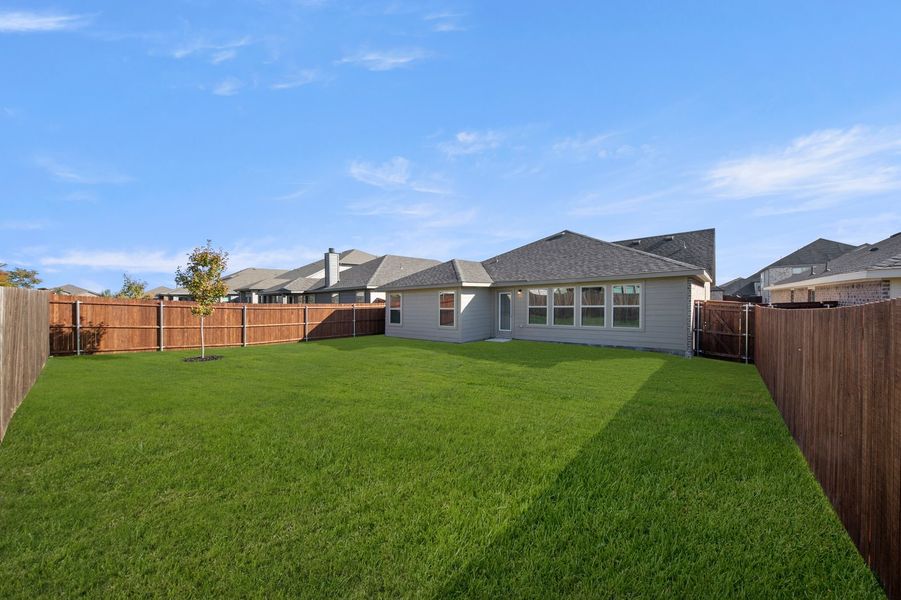 Front exterior of a new home in De Berry Reserve, Royse City, TX, highlighting curb appeal (Image 27).