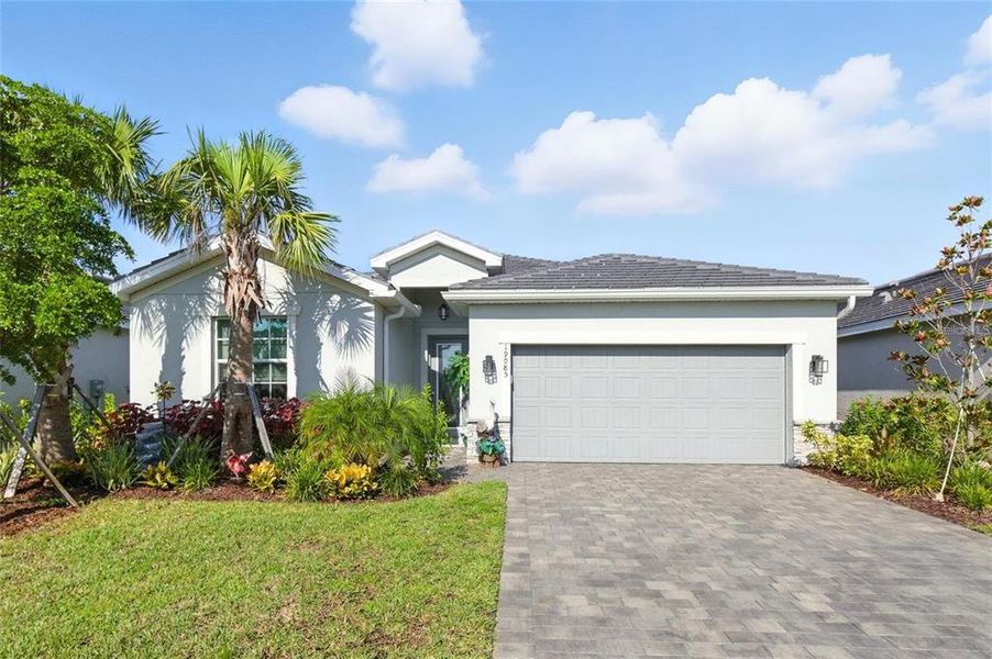 Front exterior of a new home in , Venice, FL, highlighting curb appeal (Image 22).
