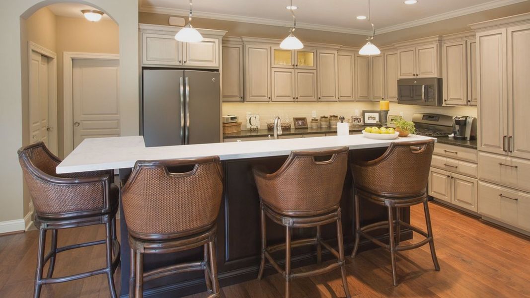 Representative furnished interior of a home built from the Portico + by Perfection Builders in The Courtyards at Oakland Hills, Louisville (Image 8).