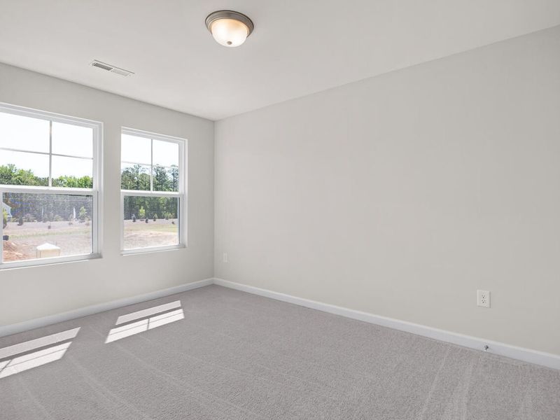 Spacious, unfurnished interior of a new home in Retreat at North Main, Lillington (Image 19).