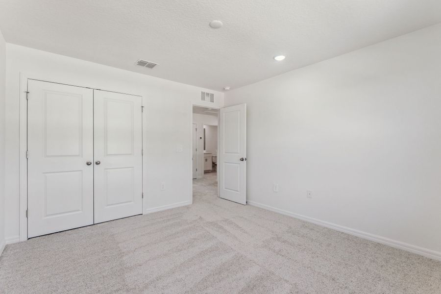 Representative unfurnished interior of a home built from the Florence by Hartizen Homes in Estes Reserve, Eustis (Image 20).
