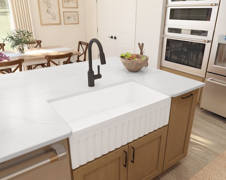 White apron-front farmhouse sink