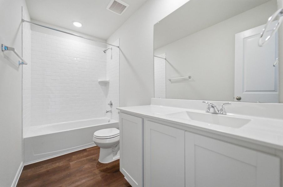 Furnished interior view inside a new home in The Pines at Seven Coves, Willis (Image 16).