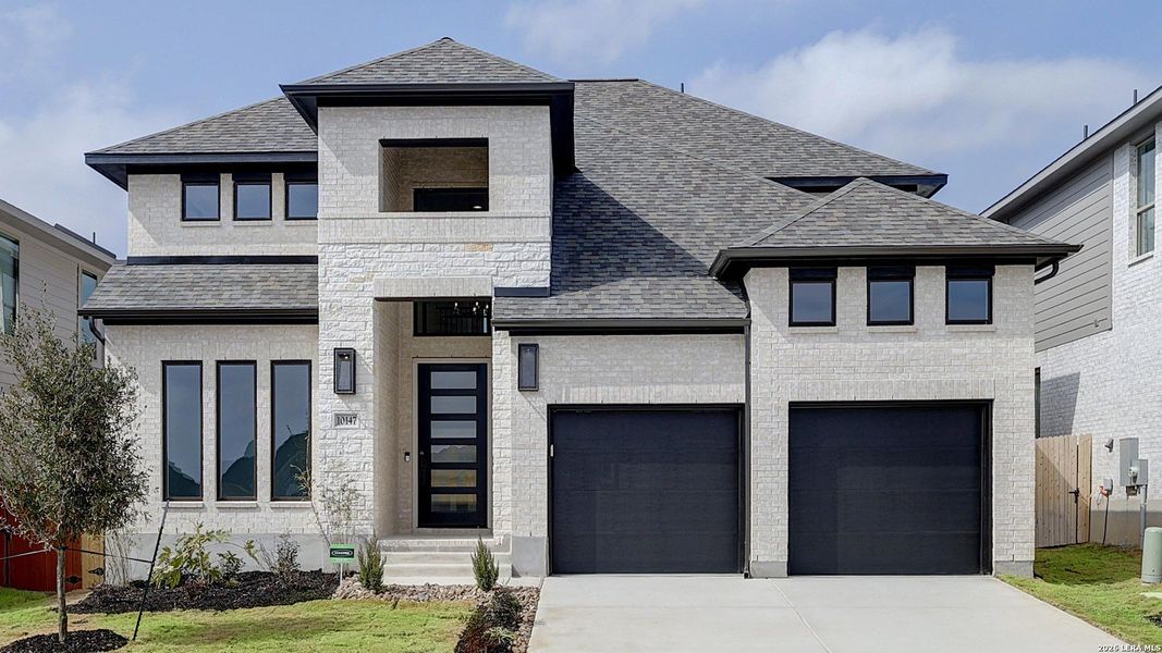 Front exterior of a new home in Kallison Ranch, San Antonio, TX, highlighting curb appeal (Image 2).