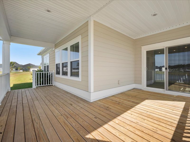 Exterior details and patio area of a home in The Coves at Lakes of Cane Bay, Summerville (Image 3).