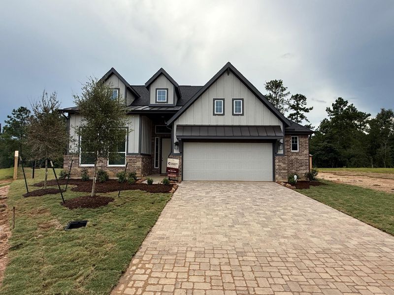 Front exterior of a new home in Kresston, Montgomery, TX, highlighting curb appeal (Image 2). Front exterior of a new home in Kresston, Montgomery, TX, highlighting curb appeal (Image 2).
