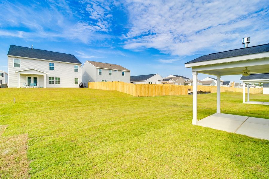 Front exterior of a new home in Winston Point, Gilbert, SC, highlighting curb appeal (Image 16).
