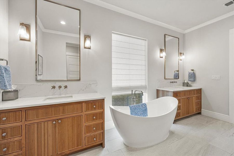 Owner's spa style bath offers the perfect space for relaxation.