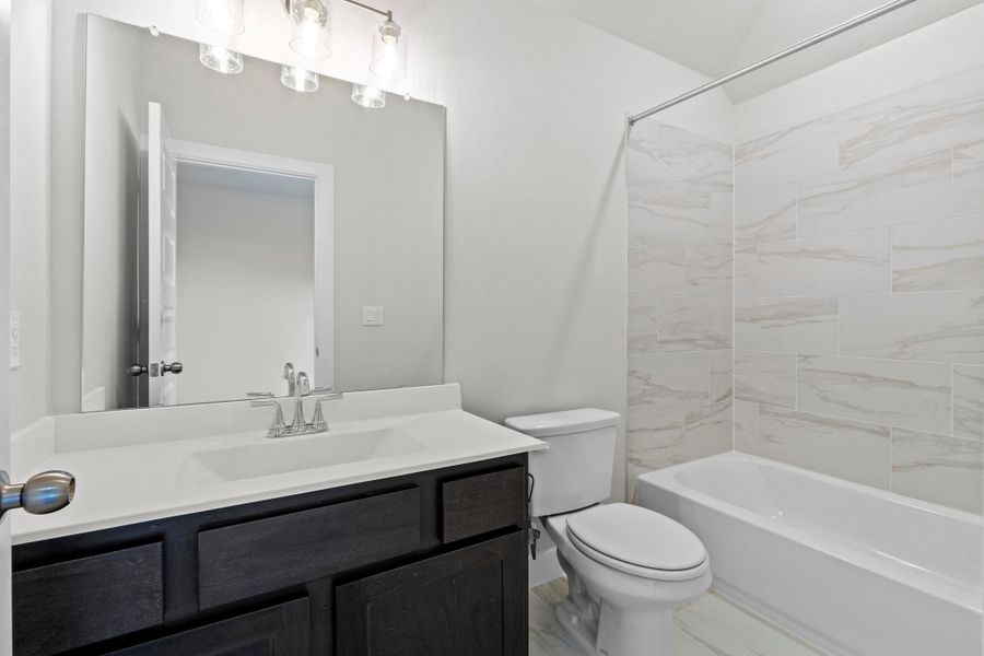 Furnished interior view inside a new home in Parmer Ranch, Georgetown (Image 14).