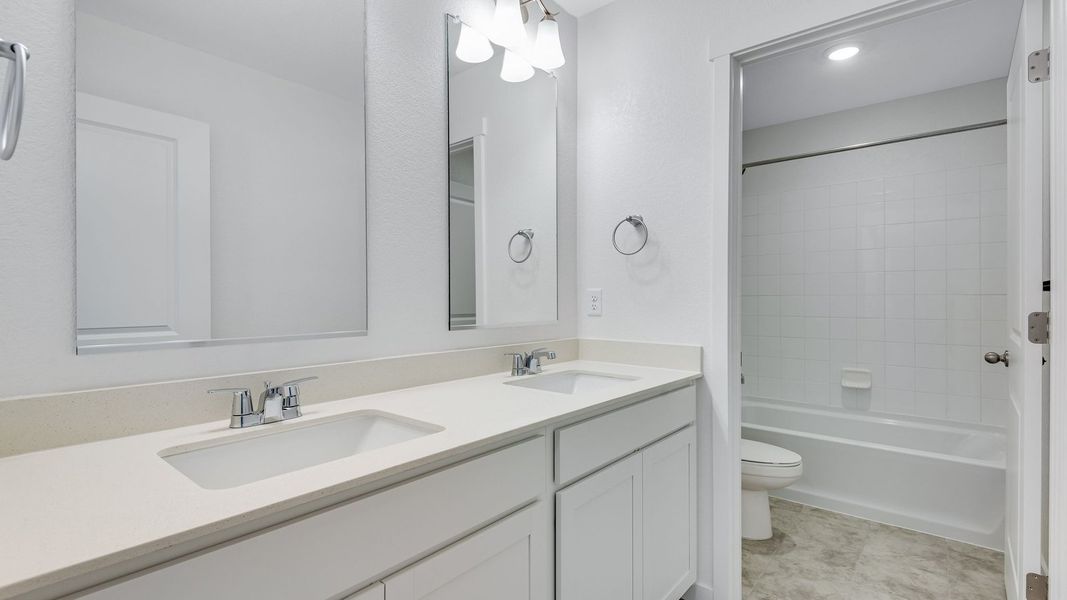 Furnished interior view inside a new home in Trails at Crowfoot, Parker (Image 9).