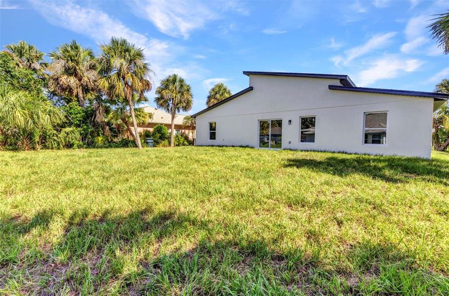 Front exterior of a new home in , North Port, FL, highlighting curb appeal (Image 21).