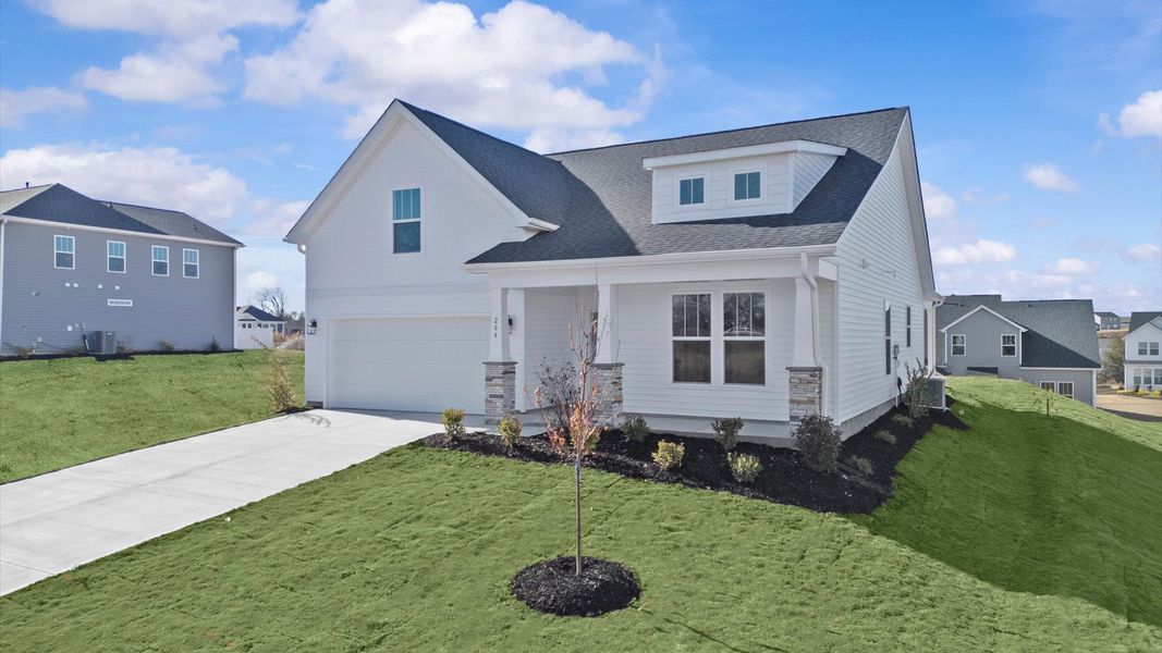 Front exterior of a new home in Woodglen, Piedmont, SC, highlighting curb appeal (Image 20).