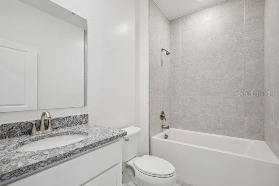 Furnished interior view inside a new home in , Punta Gorda (Image 13).