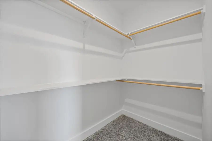 Ample shelving and hanging space defines this organized, ready-to-use closet. Ample shelving and hanging space defines this organized, ready-to-use closet.