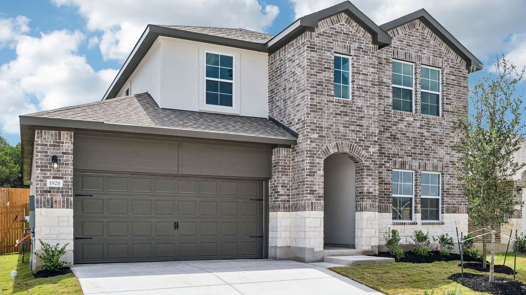 Front exterior of a new home in Rosenbusch Ranch, Leander, TX, highlighting curb appeal (Image 2).