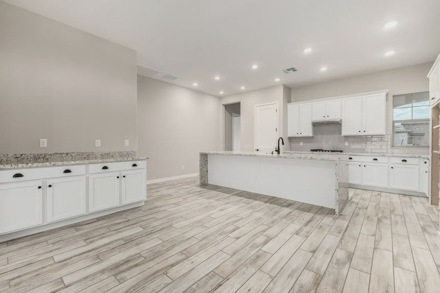 Furnished interior view inside a new home in Valencia at Granite Vista, Waddell (Image 6).