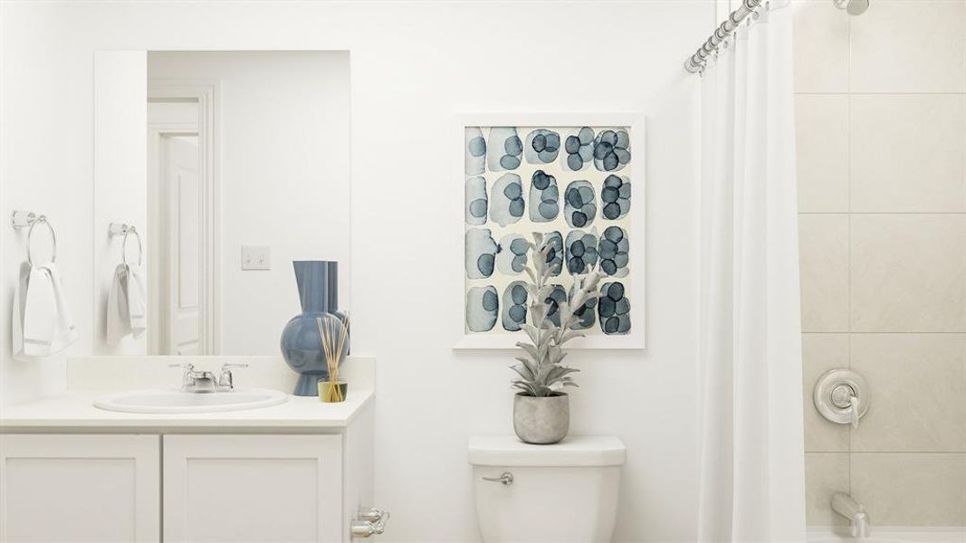 Bathroom with vanity and toilet