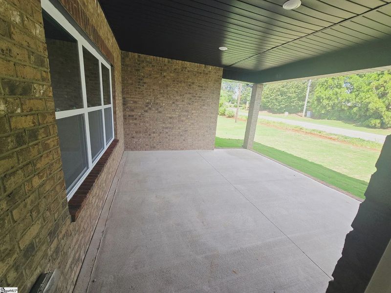 Exterior details and patio area of a home in Hidden Lake Estates, Greenville (Image 3).