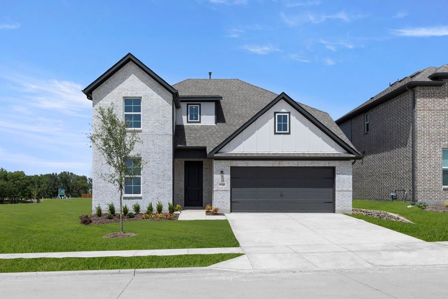 Front exterior of a new home in Creekside, Royse City, TX, highlighting curb appeal (Image 1). Front exterior of a new home in Creekside, Royse City, TX, highlighting curb appeal (Image 1).