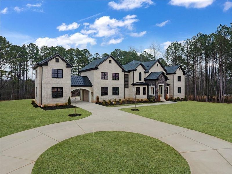 Front exterior of a new home in , Milton, GA, highlighting curb appeal (Image 2).