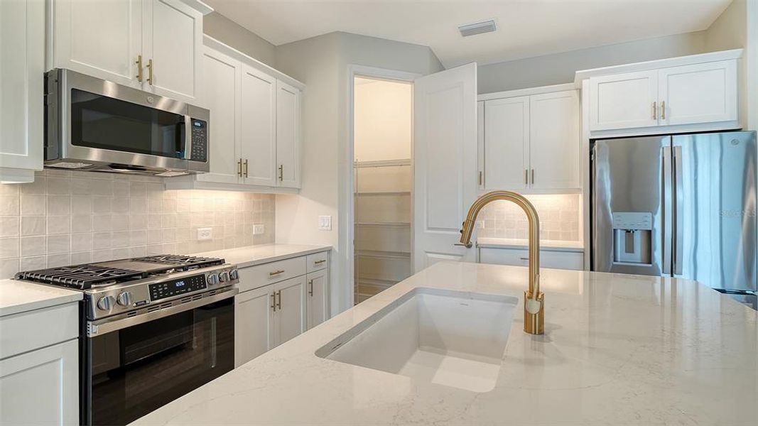 Furnished interior view inside a new home in Palm Grove, Lakewood Ranch (Image 6).