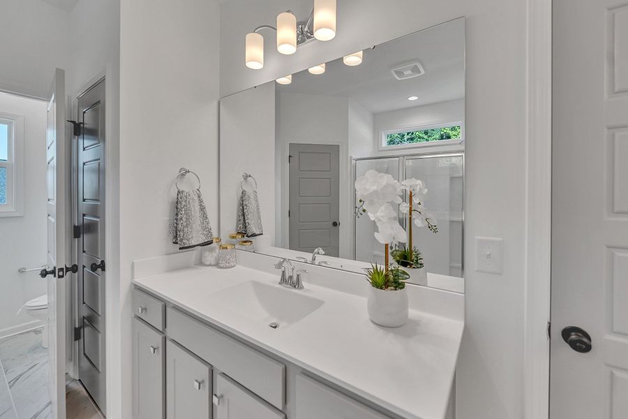 Representative furnished interior of a home built from the Blossom by Great Southern Homes in Oak Hollow, Longs (Image 30).
