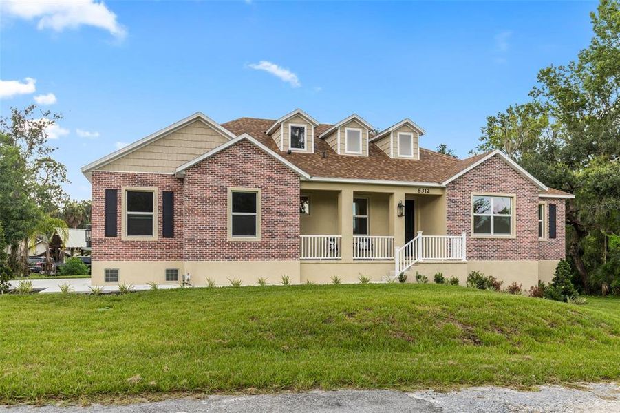 Front exterior of a new home in , Riverview, FL, highlighting curb appeal (Image 2). Front exterior of a new home in , Riverview, FL, highlighting curb appeal (Image 2).