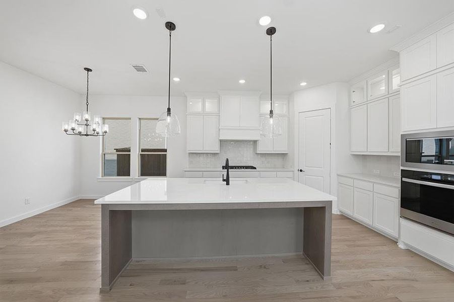 Furnished interior view inside a new home in Light Farms Brenham - 40' Lots, Celina (Image 9). Furnished interior view inside a new home in Light Farms Brenham - 40' Lots, Celina (Image 9).
