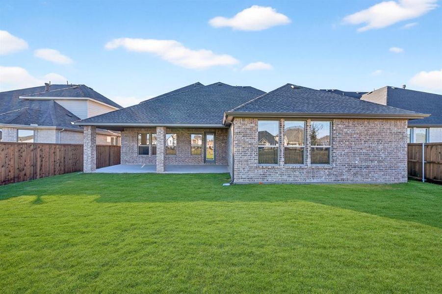 Exterior details and patio area of a home in Wellington, Haslet (Image 3). Exterior details and patio area of a home in Wellington, Haslet (Image 3).