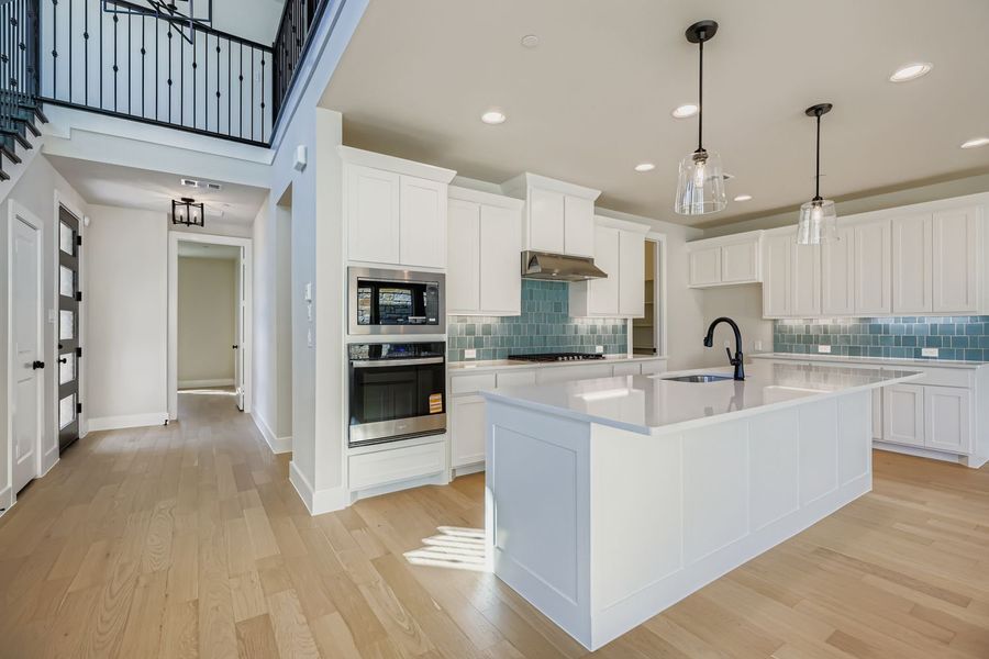 Furnished interior view inside a new home in Castle Hills Northpointe - Townhomes, Lewisville (Image 8).