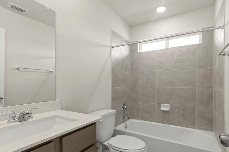 Bathroom with vanity and shower / bathtub combination Bathroom with vanity and shower / bathtub combination