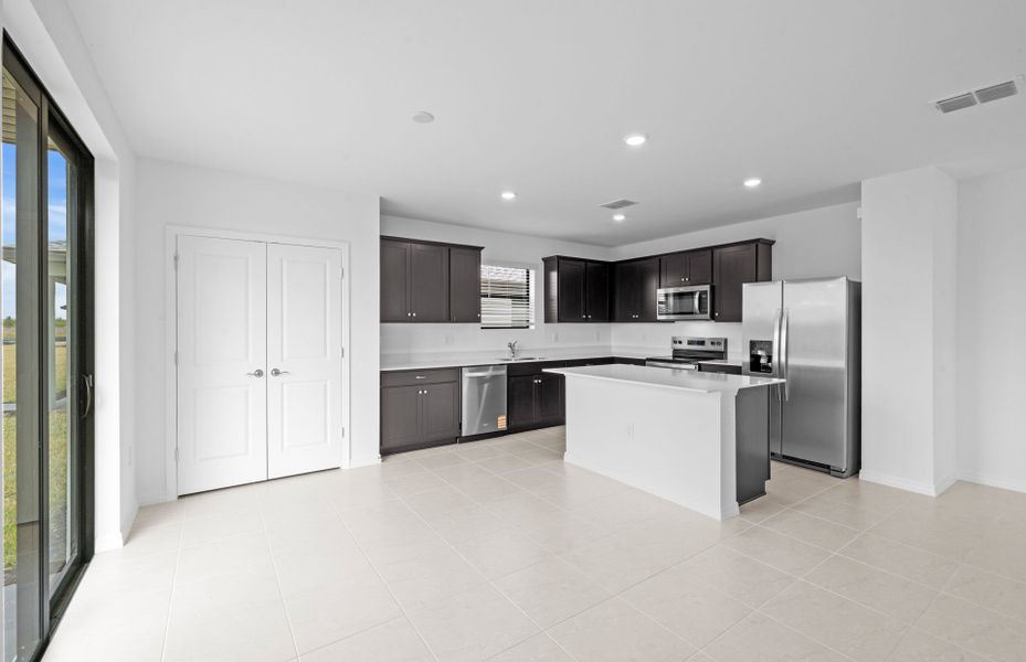Furnished interior view inside a new home in Whispering Lakes, Lehigh Acres (Image 15).
