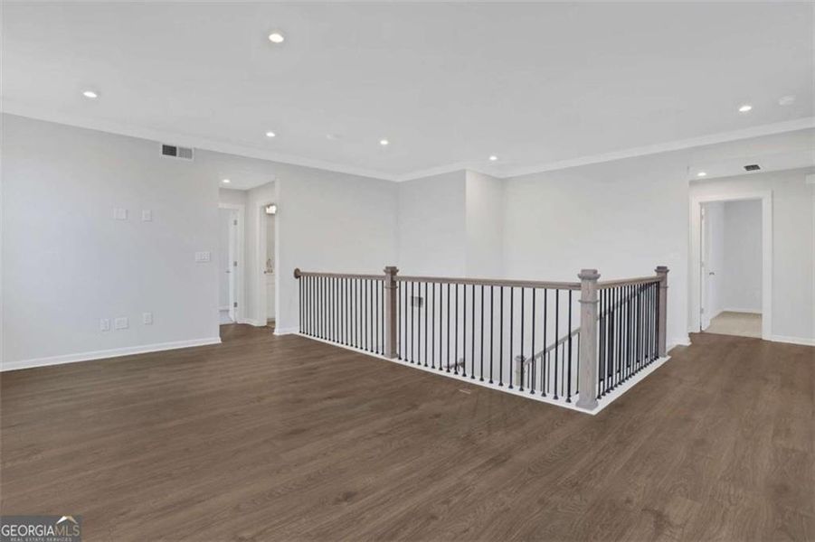 Spacious, unfurnished interior of a new home in The Paddocks at Doc Hughes, Buford (Image 46).