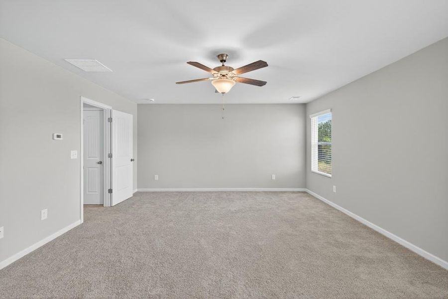 Spacious, unfurnished interior of a new home in The Reserve At Clock Tower, Douglasville (Image 17).