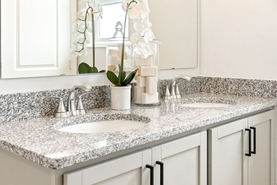 Dual-sink vanity at primary bath