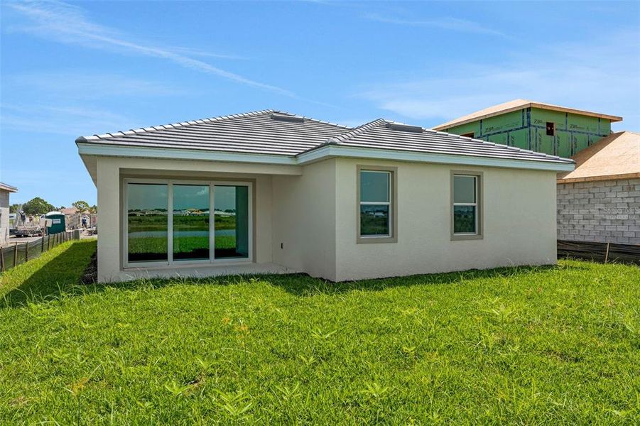 Exterior details and patio area of a home in River Hall, Alva (Image 25). Exterior details and patio area of a home in River Hall, Alva (Image 25).