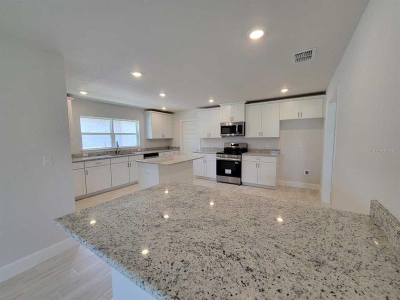 Furnished interior view inside a new home in , Ocala (Image 11).