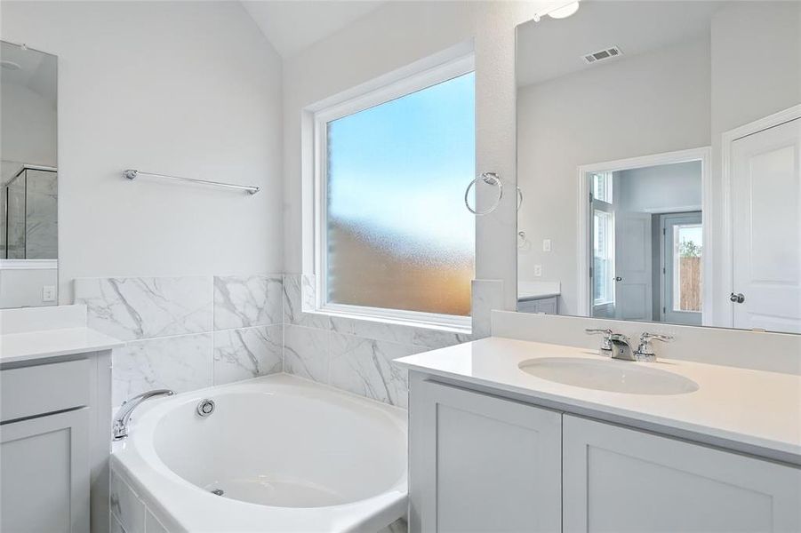 Bathroom with a shower stall Bathroom with a shower stall