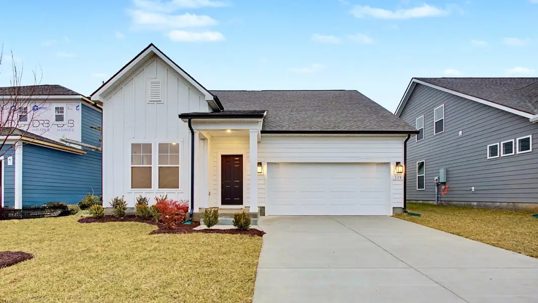 Representative exterior photo of a completed home built from the Greenwich by DRB Homes in McClure Farms, Columbia, TN (Image 18). Representative exterior photo of a completed home built from the Greenwich by DRB Homes in McClure Farms, Columbia, TN (Image 18).