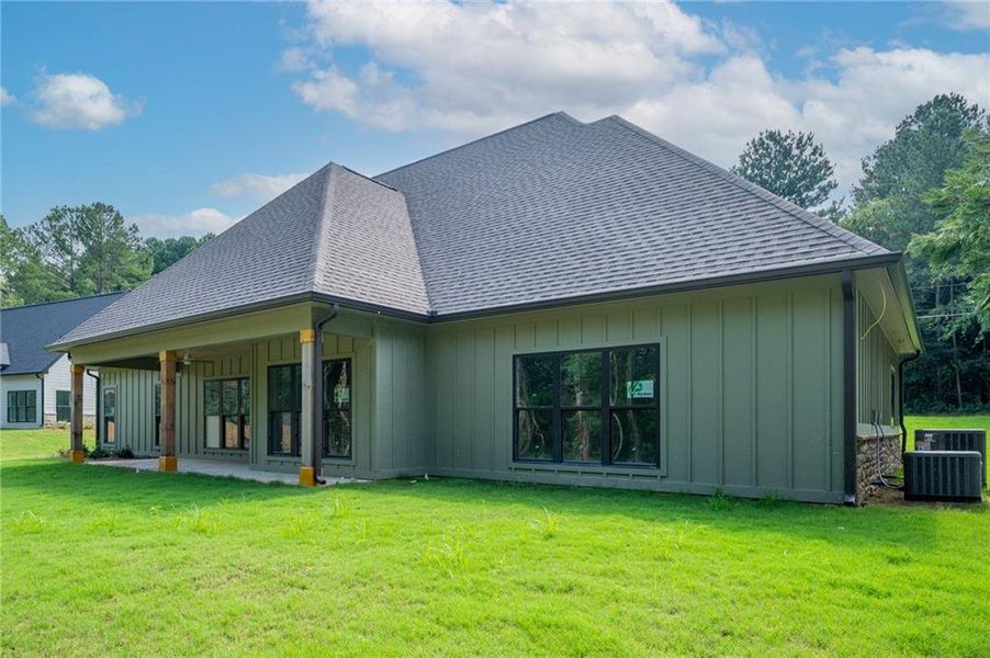 Front exterior of a new home in , Calhoun, GA, highlighting curb appeal (Image 21).