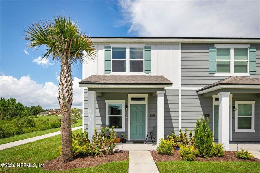 Front exterior of a new home in , Middleburg, FL, highlighting curb appeal (Image 23).