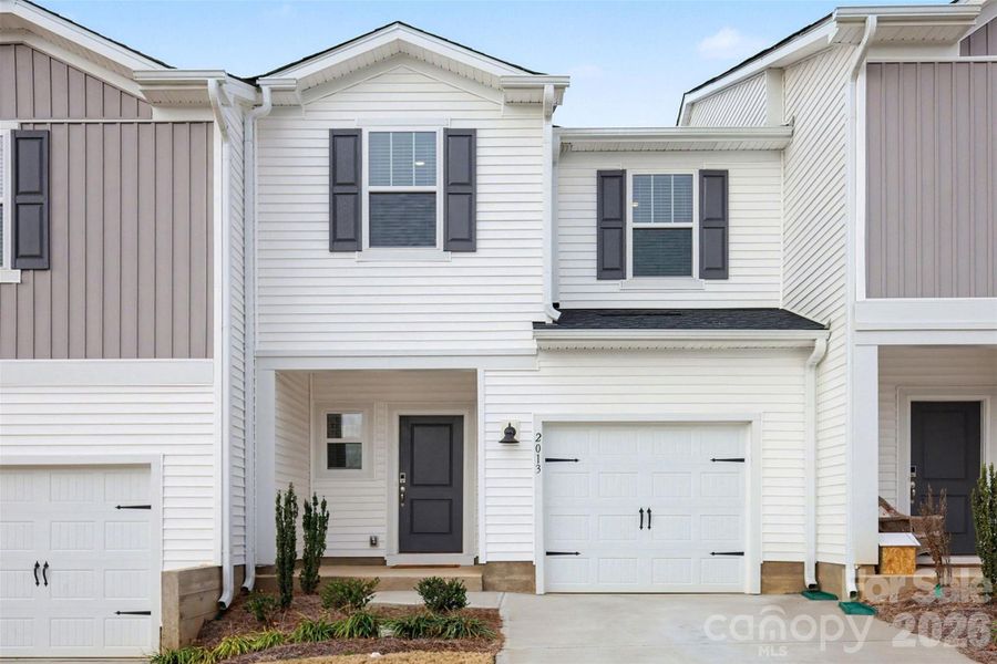 Front exterior of a new home in , Concord, NC, highlighting curb appeal (Image 20). Front exterior of a new home in , Concord, NC, highlighting curb appeal (Image 20).