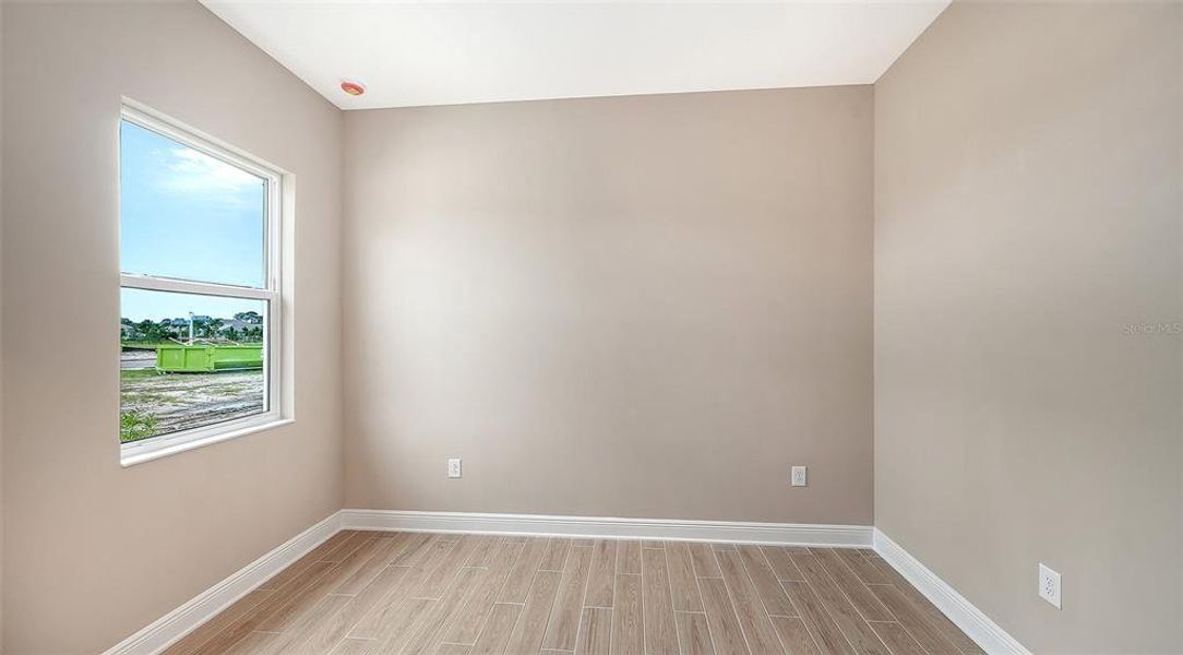 Spacious, unfurnished interior of a new home in Grand Park, Sarasota (Image 34). Spacious, unfurnished interior of a new home in Grand Park, Sarasota (Image 34).