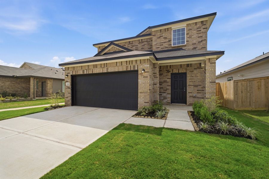Front exterior of a new home in Colony at Pinehurst, Pinehurst, TX, highlighting curb appeal (Image 28).