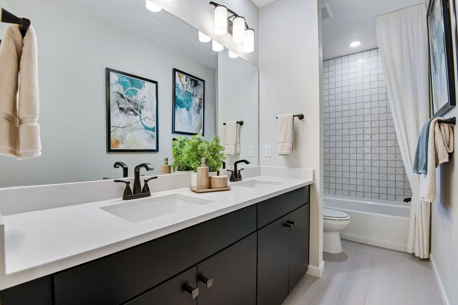 Furnished interior view inside a new home in Reunion, Commerce City (Image 11).