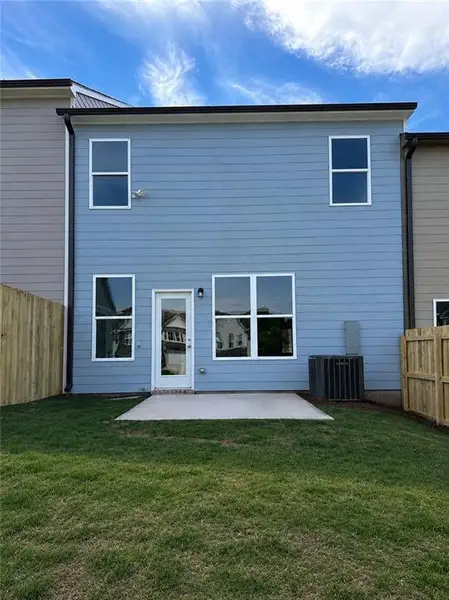 Exterior details and patio area of a home in Somerset at Riverbrook, Gainesville (Image 4).