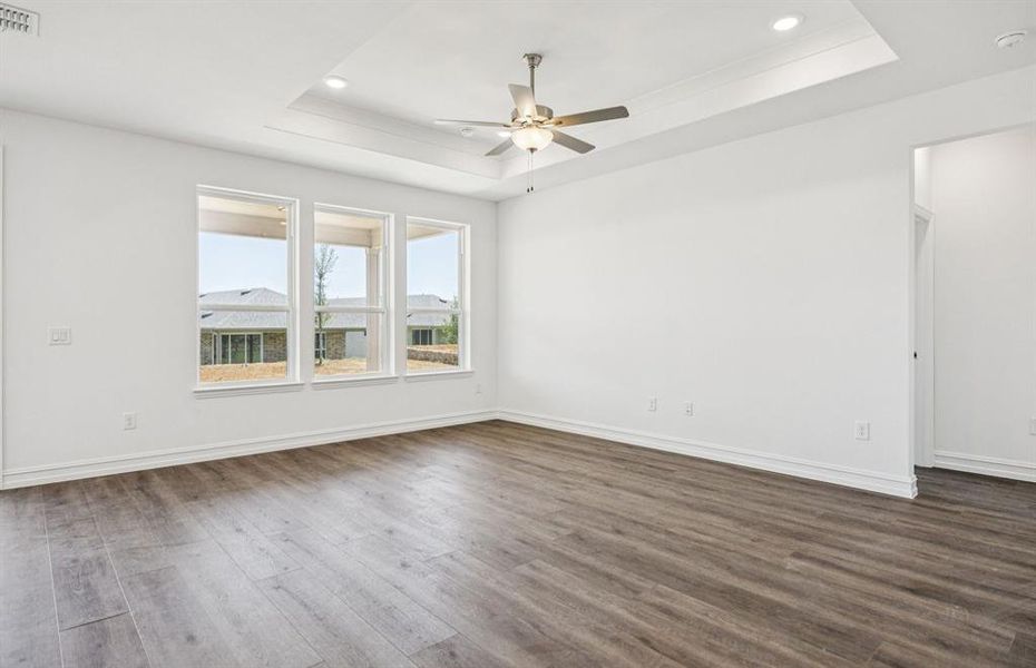 Expansive gathering room bathed in natural sunlight *Real home pictured Expansive gathering room bathed in natural sunlight *Real home pictured
