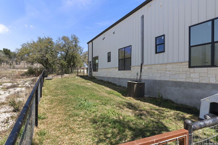 Exterior details and patio area of a home in , Bulverde (Image 16).